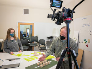 Jeff Henderson and Claire Bank recording the Buildings in a Landscape illustration for the ACE Mentor Program session.